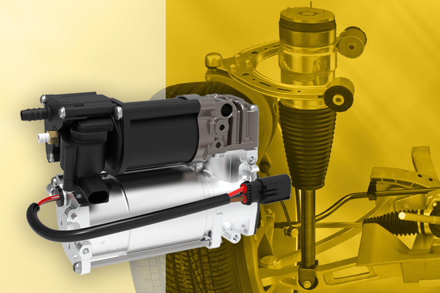Magneti Marelli Parts & Services kompressor til luftaffjedring i forgrunden, med hjul, aksel og luftaffjedringssystem i baggrunden, der illustrerer komponentens anvendelse.